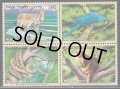 国連切手　1999年　絶滅危惧種　鳥　スミレコンゴウインコ　4種